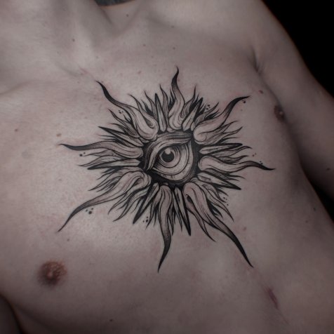 Татуировка в стиле тату графика солнце