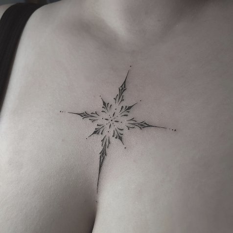 Татуировка в стиле тату графика звезда