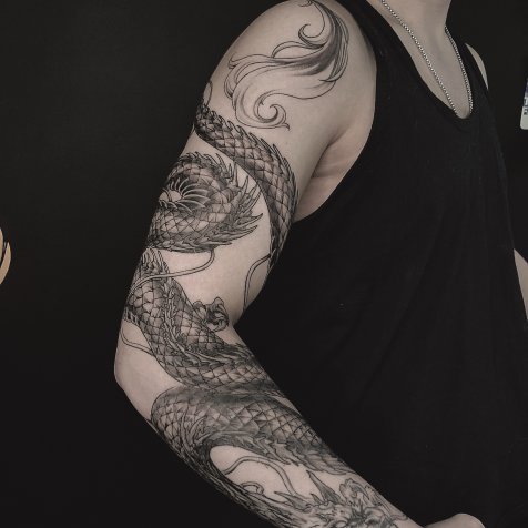 Татуировка в стиле тату графика дракон